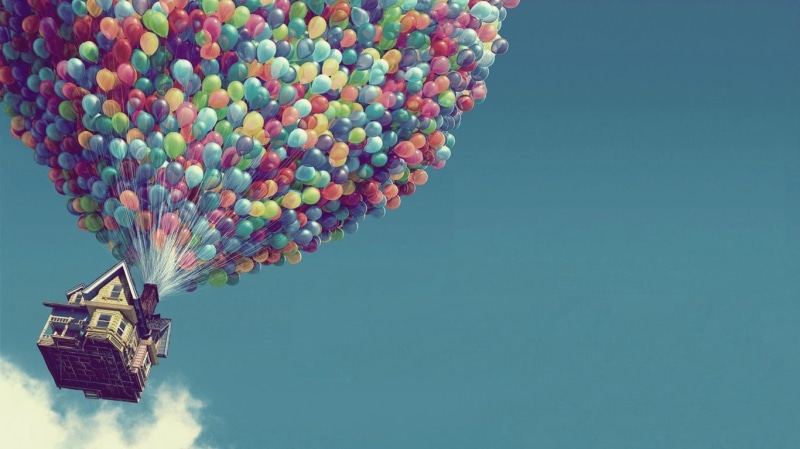 outdoors, freedom, blue, no people, low angle view, motion, mid-air, mode of transportation, architecture, excitement, transportation, Pixar Animation Studios