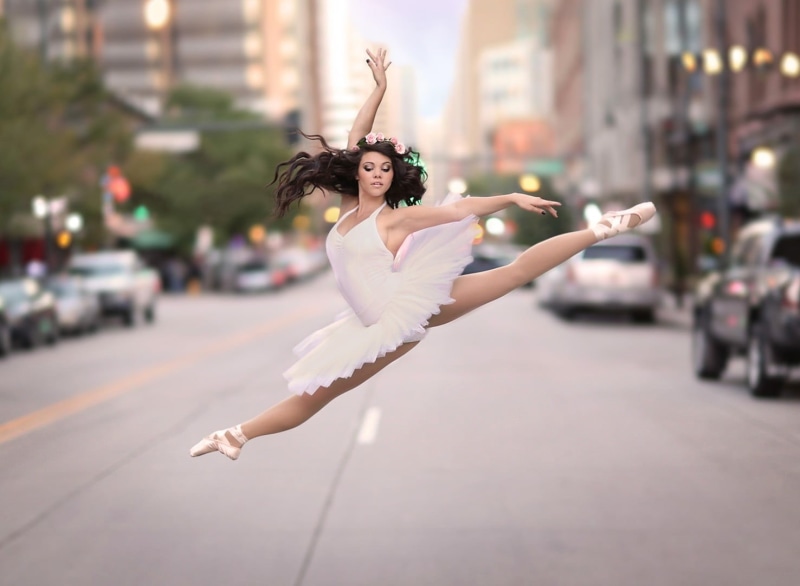 human arm, street, beautiful woman, adult, city, skill, limb, ballerina, focus on foreground, ballet dancer, real people, ballet, young adult, dancing