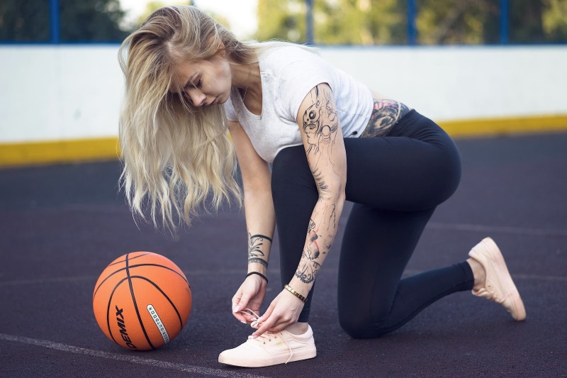 720P, sneakers, lifestyles, one person, basketball - ball, full length, necklace, blond hair, young women, tattoo, leisure activity, hair, ball, sport