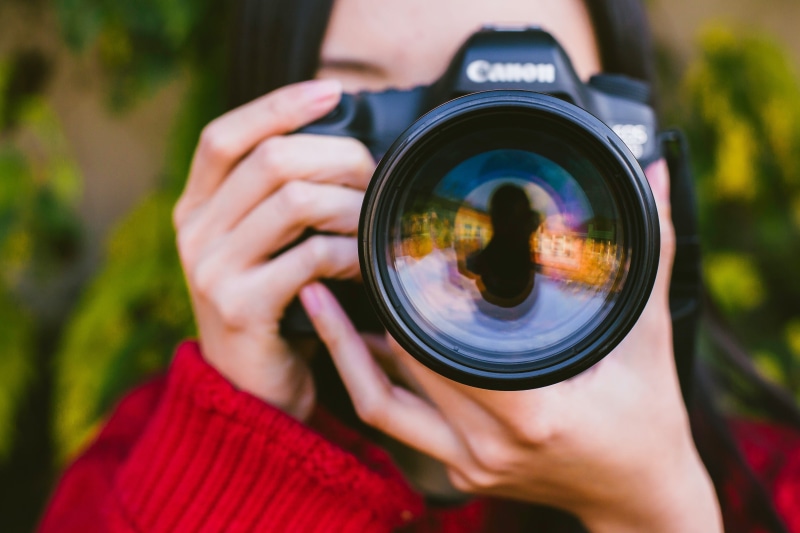 outdoors, activity, portrait, caucasian Ethnicity, focus on foreground, taking, camera - Photographic Equipment, filming, photography Themes, modern, photographing