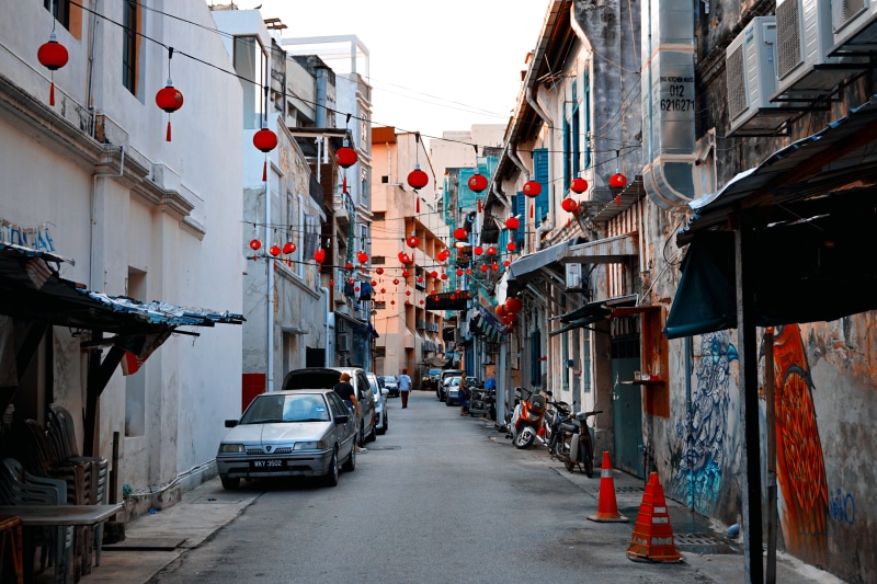 architecture, narrow, building, porch, day, urban, outdoors, kuala lumpur, building exterior, alley, town, lorong panggung, several, motor vehicle, near