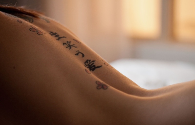 hayden winters, domestic room, indoors, macro, luxury, people, ink, human limb, kanji, back, history, copy space, text, human body part, 2K, midsection