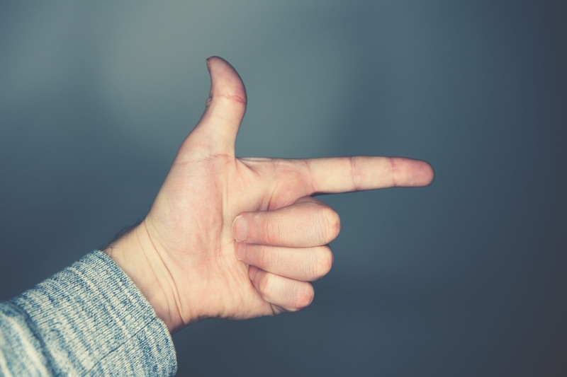 s, close-up, gray background, studio shot, pointing, hand, gesturing, arm, gray, communication, people, colored background, gun, showing, indoors, human limb