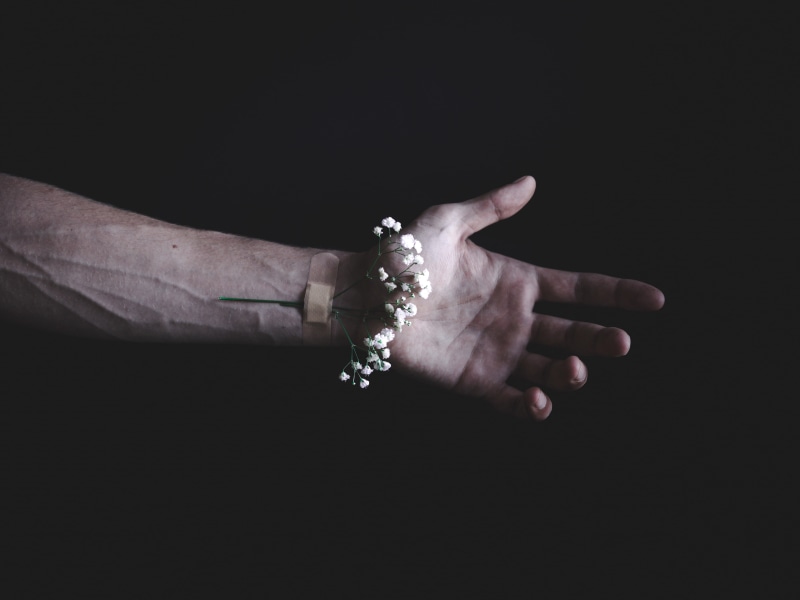 unrecognizable person, men, human finger, adult, conceptual, man, aid, death, studio shot, vein, one person, tumblr, flowers, jewelry, copy space, udeground