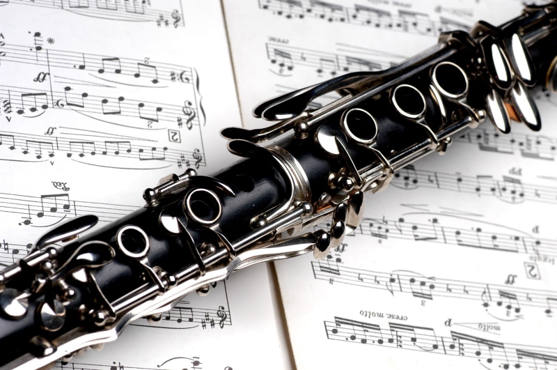 music, 2K, no people, close-up, paper, high angle view, wind instrument, sheet, text, sheet music, musical equipment, arts culture and entertainment, musical