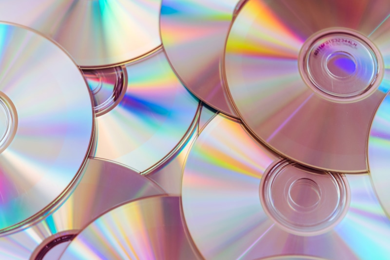 Compact Discs, technology, dVD, djing, play, transparent, purple, disk, copying, information Medium, no people, music, CDs, circle, media, playing, shape