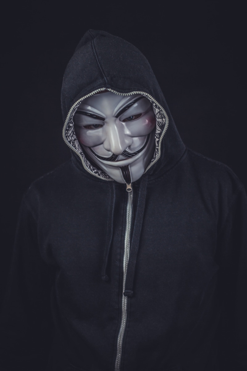 self-confidence, clothing, internet, waist up, v for vendetta, person, indoors, anonymity, thoughts, zip, vendetta, human face, think, obscured face, looking at camera