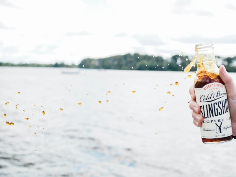 freshness, spill, western script, message, droplet, container, lake, person, day, glass, coffee, slingshot, jar, communication, sea, water, cold brew, drink