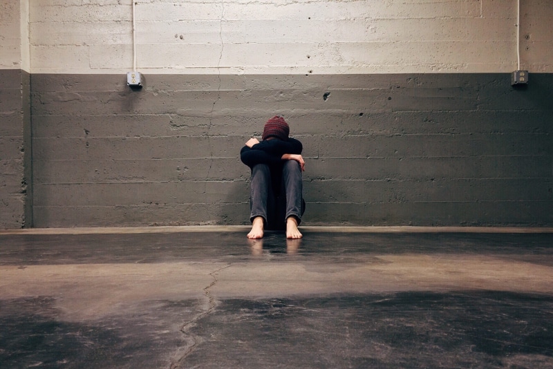 real people, despair, fear, emotion, solo, full length, man, adult, built structure, sadness, solitude, contemplation, depression, teenager, one person
