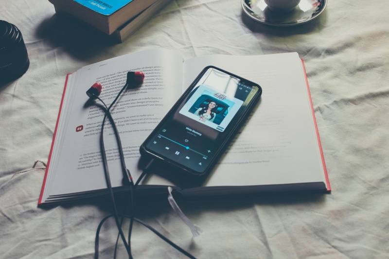 calming, mobile phone, android, relaxation, smartphone, earphones, screen, paper, apparel, high angle view, morocco, reading, cell phone, communication