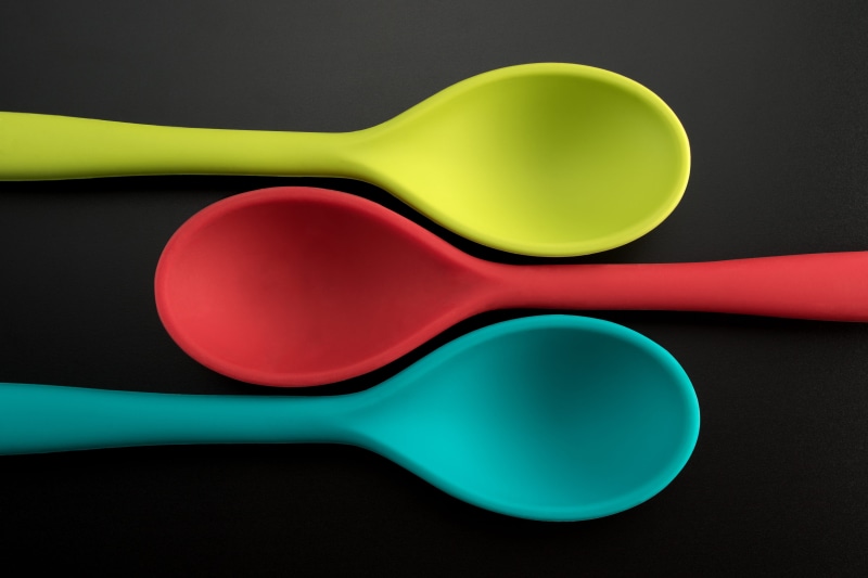 kitchen utensil, studio shot, household equipment, indoors, silicone, 5K, purple, black background, plastic, product, object, bright, directly above, abstract backgrounds