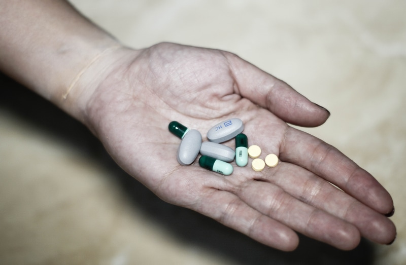 hand, migraine, emotion, bipolar, stress, health, psychology, care, sadness, pills, illness, head, people, face, medical, capsule, help, therapy, close-up