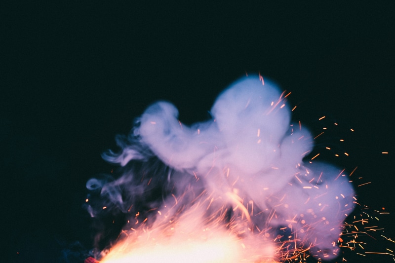 nighttime, copy space, motion, smoke - physical structure, flame, heat - Temperature, light, no people, fire - Natural Phenomenon, producing, backgrounds