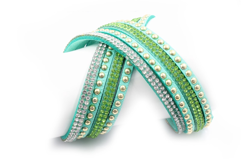 gold, stainless, art and craft, isolated, pleasure, green color, charm, hand, ornate, cut out, commercial, fashion, pattern, jewel, multi colored, design