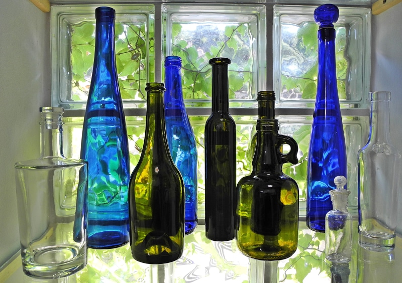 green, 2K, bottle, large group of objects, colored glass, arrangement, blue, window, indoors, no people, research, glass brick, shelf, variation, science