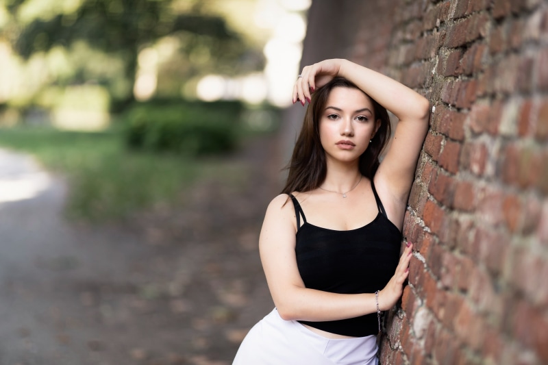 portrait, black tops, leisure activity, beauty, lifestyles, hairstyle, 2K, painted nails, brunette, young women, looking at viewer, women, wall - building feature