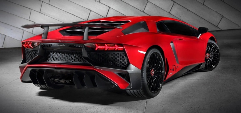 red, rear, land vehicle, auto racing, motorsport, chrome, car, transportation, style, indoors, vehicle, coupe, personal land vehicle, modern, wheel, italian