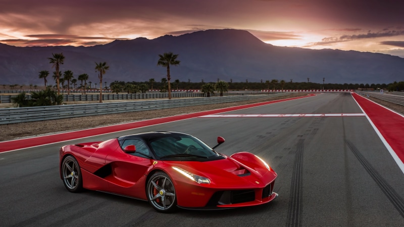 luxury vehicle, speed, land vehicle, mountain, competition, symbol, ferrari, mountain range, sky, motor vehicle, sports race, red car, ferrari la ferrari