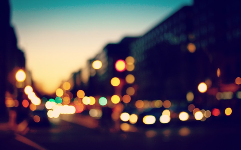 motor vehicle, skyscraper, shiny, night, urban Scene, backgrounds, light - Natural Phenomenon, outdoors, vehicle light, lights, red, multi Colored, defocused