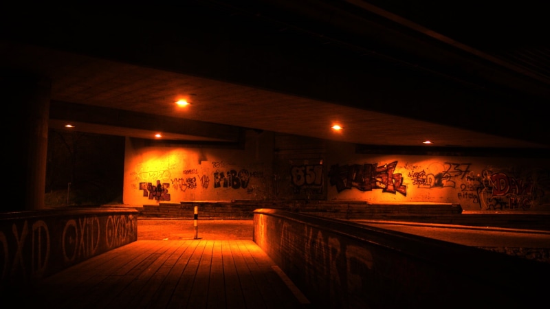 pavement, lamp, electric lamp, no people, dark, absence, empty, bridge, food and drink, city, lighting equipment, railing, indoors, built structure, graffiti