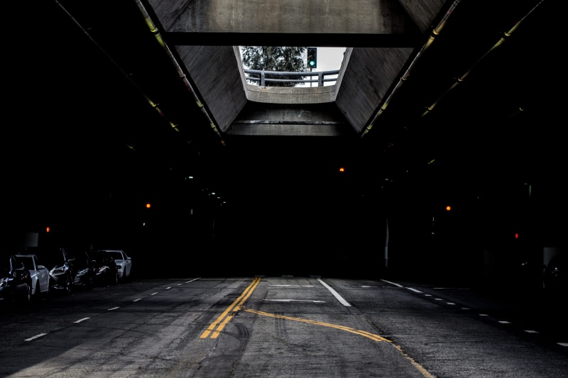 asphalt, diminishing perspective, empty, los angeles, the way forward, parked, arrow symbol, sign, ceiling, long, landscape, street, road, underpass, mode of transportation