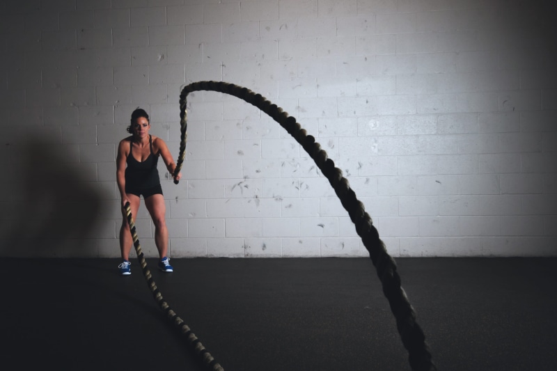 looking at camera, adult, clothing, indoors, fitness, woman, portrait, ropes, real people, sport, women, holding, person, lifestyles, 2K, crossfit, beautiful woman
