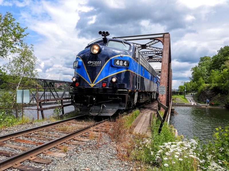 mode of transportation, vehicle, tree, train - vehicle, nature, 2K, train, railroad car, sky, machine, locomotive, railroad, cloud - sky, engine, connection