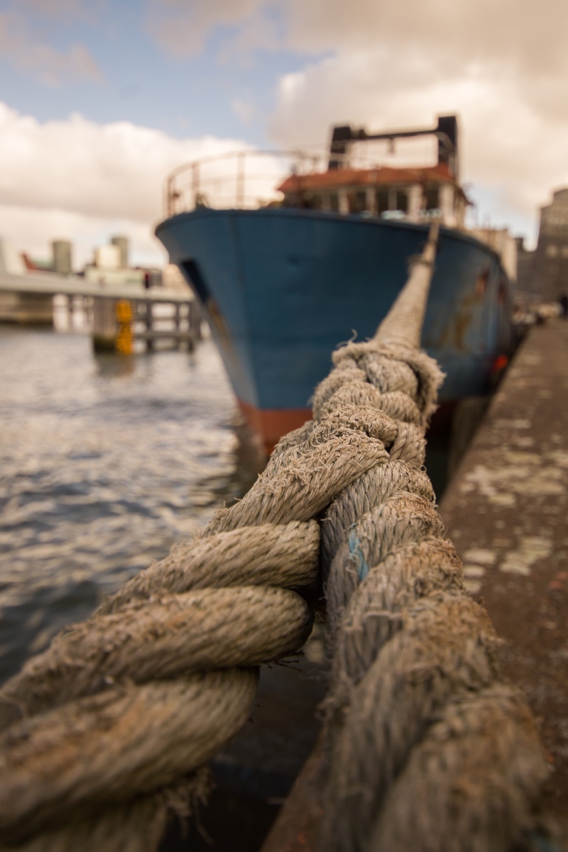 sea, bollard, rope, nautical, nautical vessel, port, ship, sky, sailboat, water, shipping, tied up, moored, dock, blue, mode of transportation, fishing industry