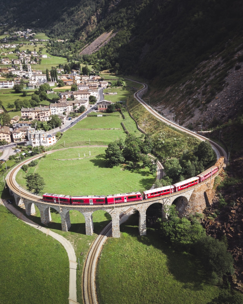 railroad, motion, switzerland, journey, aerial, move, rail, way, movement, perspective, plant, sport, curve, platform, station, sky, mountain, track, nature