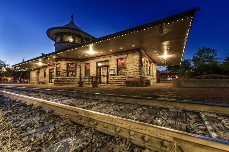 track, mode of transportation, transit, train, nature, night, train station, passengers, freight, station, railroad track, beside, public transportation