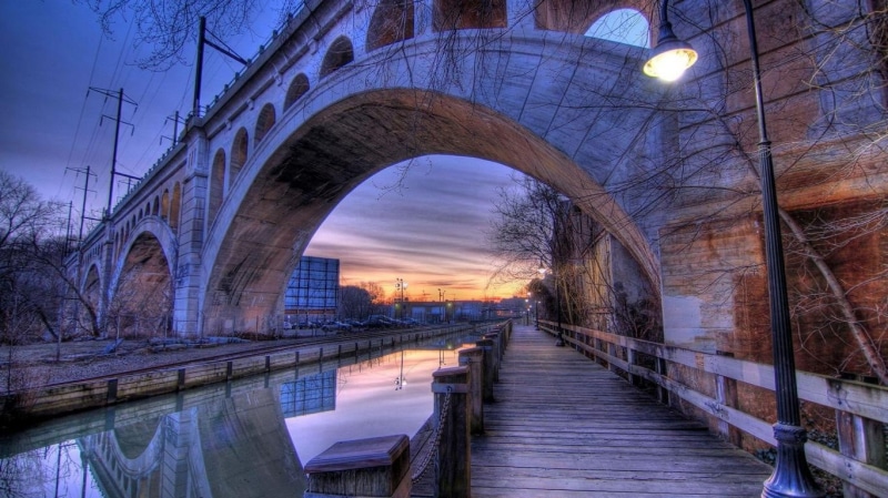water, dusk, building, railing, arch, connection, direction, nature, diminishing perspective, river, the way forward, gray, no people, footbridge, bridge - man made structure