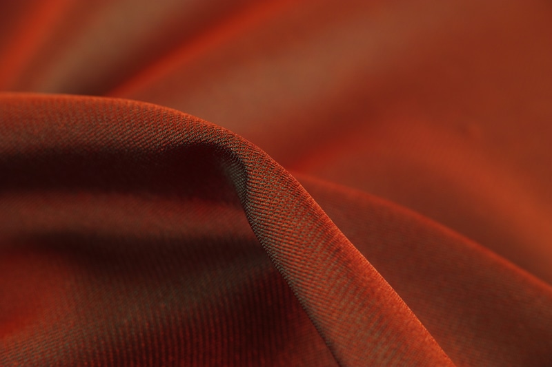 wool, abstract backgrounds, cotton, detail, close-up, vivid color, painted, indoors, curve, soft, cover, head cover, yarn, macro, selective focus, orange color