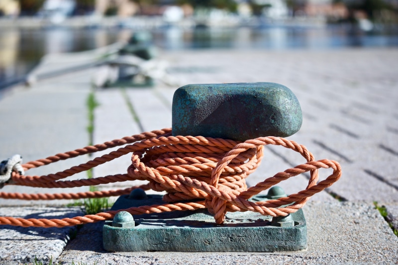 transportation, bollard, italy, bokeh, bond, tie, strength, bitta, maritime, container, boats, nature, tied up, sea, rope, metal, focus on foreground, outdoors