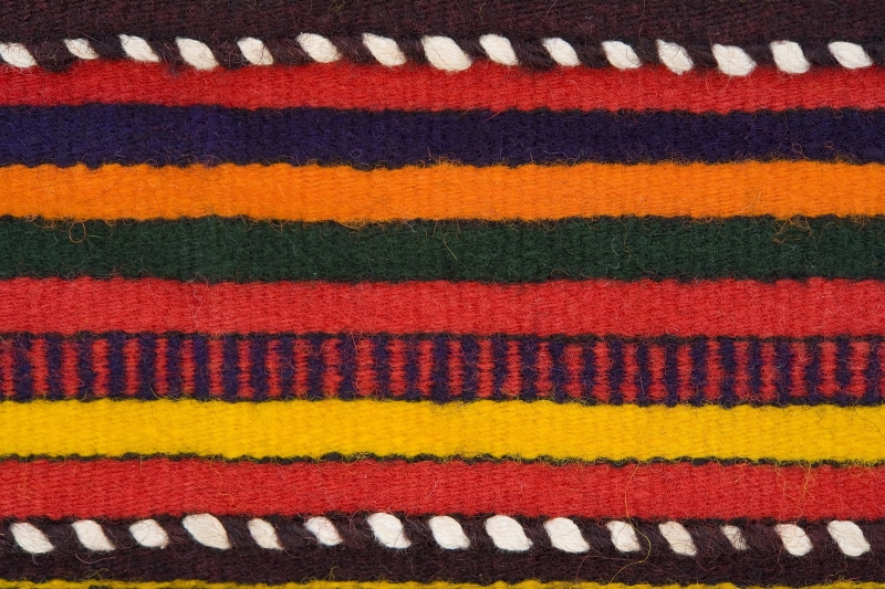 textured, variation, blanket, yellow, indoors, natural, blue, carpet - decor, orange, black, home, red, pattern, no people, cotton, textile, orange color