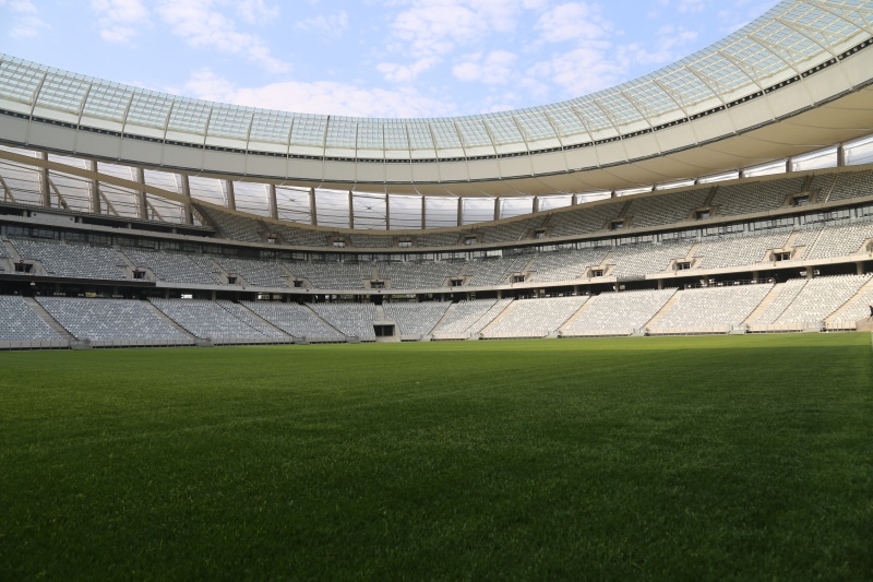 team sport, outdoors, day, sports, playing field, Football, cloud - sky, cape town, green color, white, competition, south africa, green, Stadium, sky
