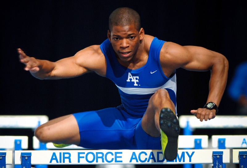 muscular build, athletic, race, competition, man, clothing, running, front view, concentration, hurdler, young adult, athlete, exercising, 2K, lifestyles