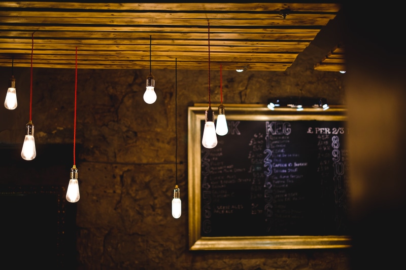 night, low angle view, lot, black, dim, electricity, wall, urban, beside, light - natural phenomenon, red, ceiling, pendant, business, indoors, decor, location