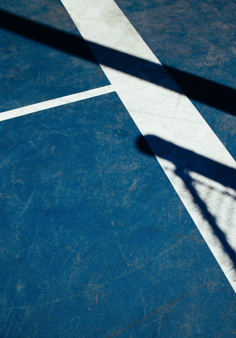white, white color, outdoors, backgrounds, floor, pattern, angle, parking, texture, court, graphic, dividing line, close-up, focus on shadow, blue, nature