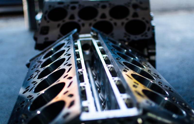 high angle view, control, engine block, selective focus, factory, connection, close-up, manufacturing equipment, film reel, indoors, cylinder, film industry
