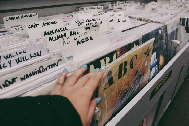 close-up, shop, choose, vinyl, paper, western script, vintage, abba, hand, acdc, finger, human body part, sleeves, lifestyles, high angle view, real people