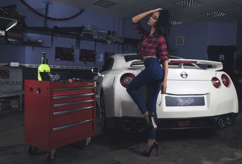 portrait, jeans, young adult, adult, young women, front view, leisure activity, red, beautiful woman, women, standing, lifestyles, land vehicle, garages