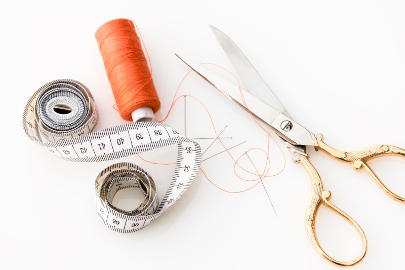 isolated, sewing, coiled, metal, 5K, beside, jewelry, personal accessory, still life, equipment, text, the thread is cut, stainless steel, white background
