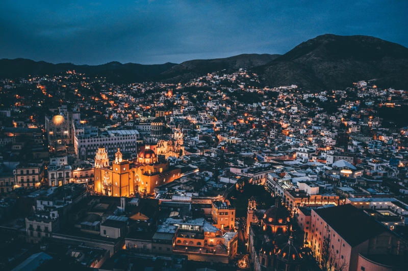 community, cityscape, built structure, 5K, illuminated, residential district, nature, mountain, religion, city, townscape, outdoors, panoramic view, church