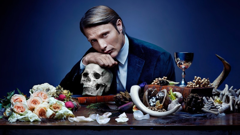 one person, freshness, food and drink, vegetable, table, waist up, Hannibal, flower, Mads Mikkelsen, blue, flowering plant, glass, business, sitting, mads