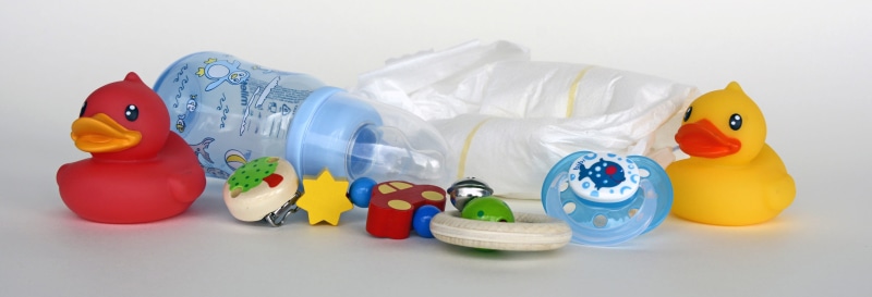 babysit, animal, animal representation, indoors, pacifier chain, close-up, toy, no people, still life, red, play, representation, rubber duck, studio shot