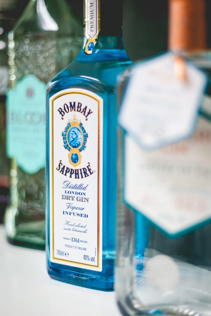 transparent, focus on foreground, selective focus, bottle, refreshment, non-western script, text, focus, no people, bombay, sapphire, beverage, still life