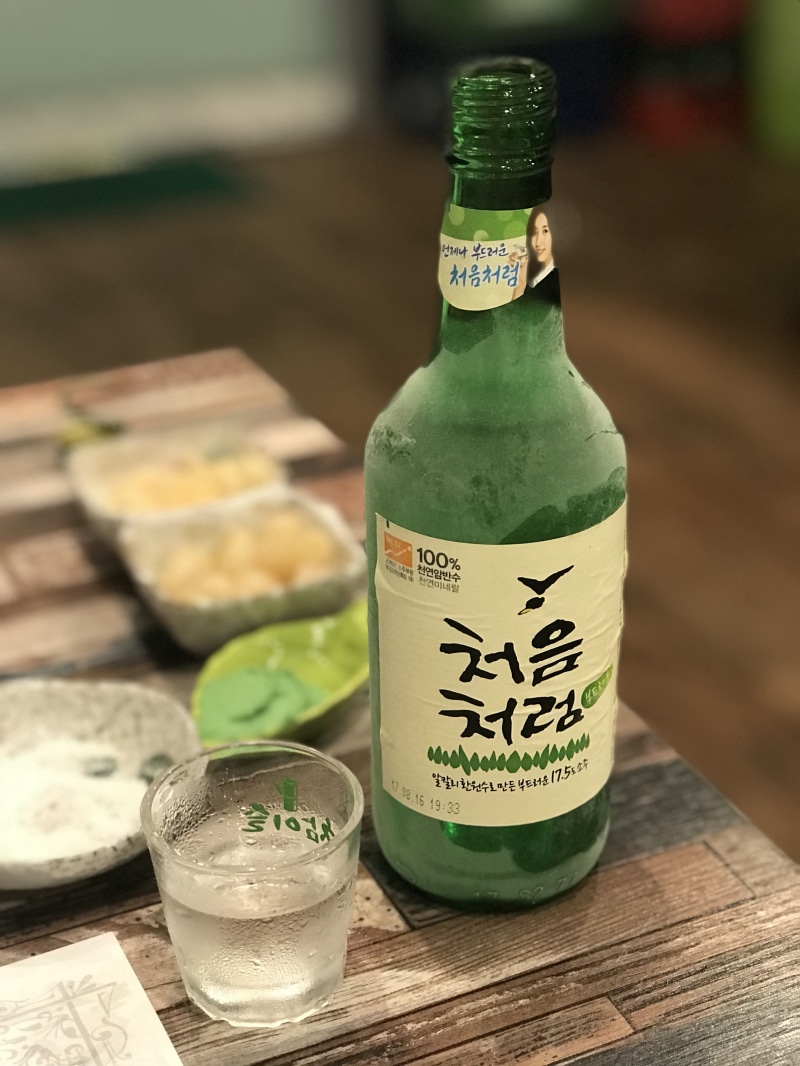 western script, wood - material, green, drink, refreshment, freshness, no people, glass - material, bottle, food, glass, food and drink, bar, close-up