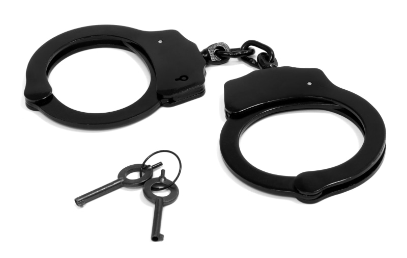 conflict, high angle view, 2K, indoors, handcuffs, jail, police, bondage, single object, crime, music, equipment, protection, white background, law, arrest