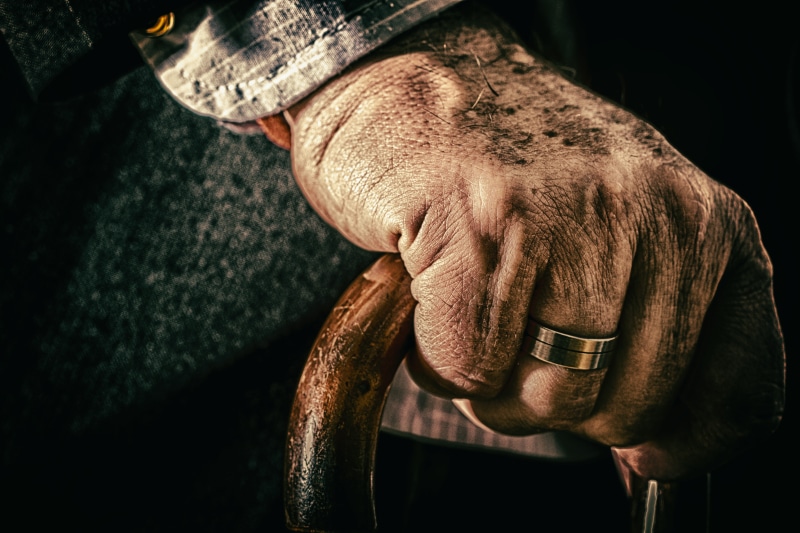 chief, black background, board, one person, real people, 8K, old, grandfather, vertebrate, loneliness, bastòn, mammal, elderly, hands, focus on foreground