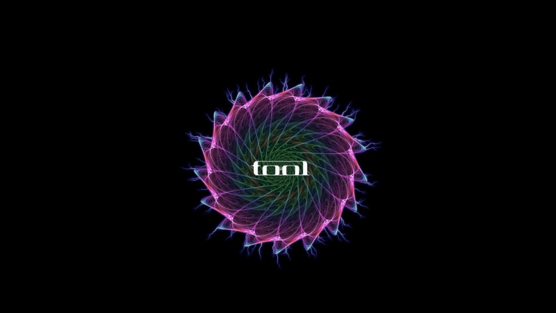  illuminated, light painting, simple background, alternative metal , design, single object, black background, close-up, creativity, no people